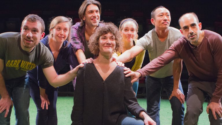  The members of Team Sunshine Performance Corporation's 'The Sincerity Project' at FringeArts: In the center is Melissa Krodman. The other cast members, who have her back, from left: Ben Camp, Jenna Horton, Mark McCloughan, Rachel Camp, Makoto Hirano and Aram Aghazarian. 