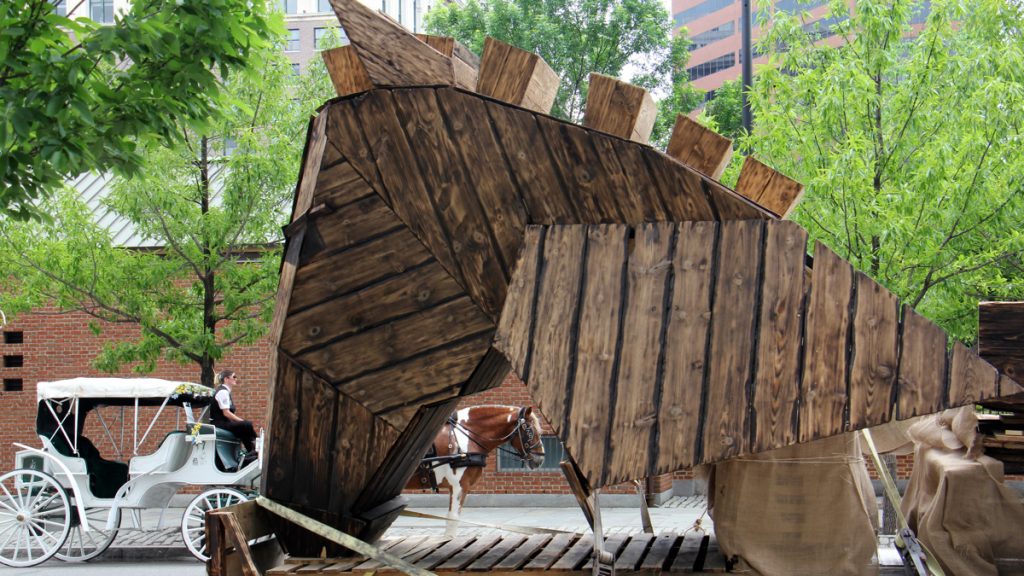 The Trojan Horse beds down for the night on Fifth Street, blending with the carriage horses. (Emma Lee/WHYY)
