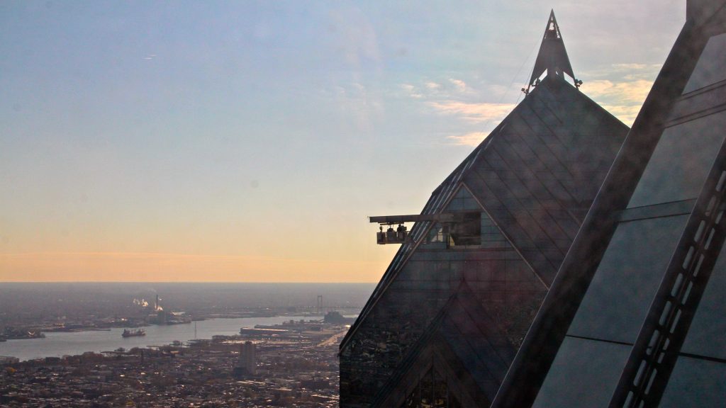 7observation deck Window washers work from a hanging basket on neighboring Two Liberty Place. (Emma Lee/WHYY)