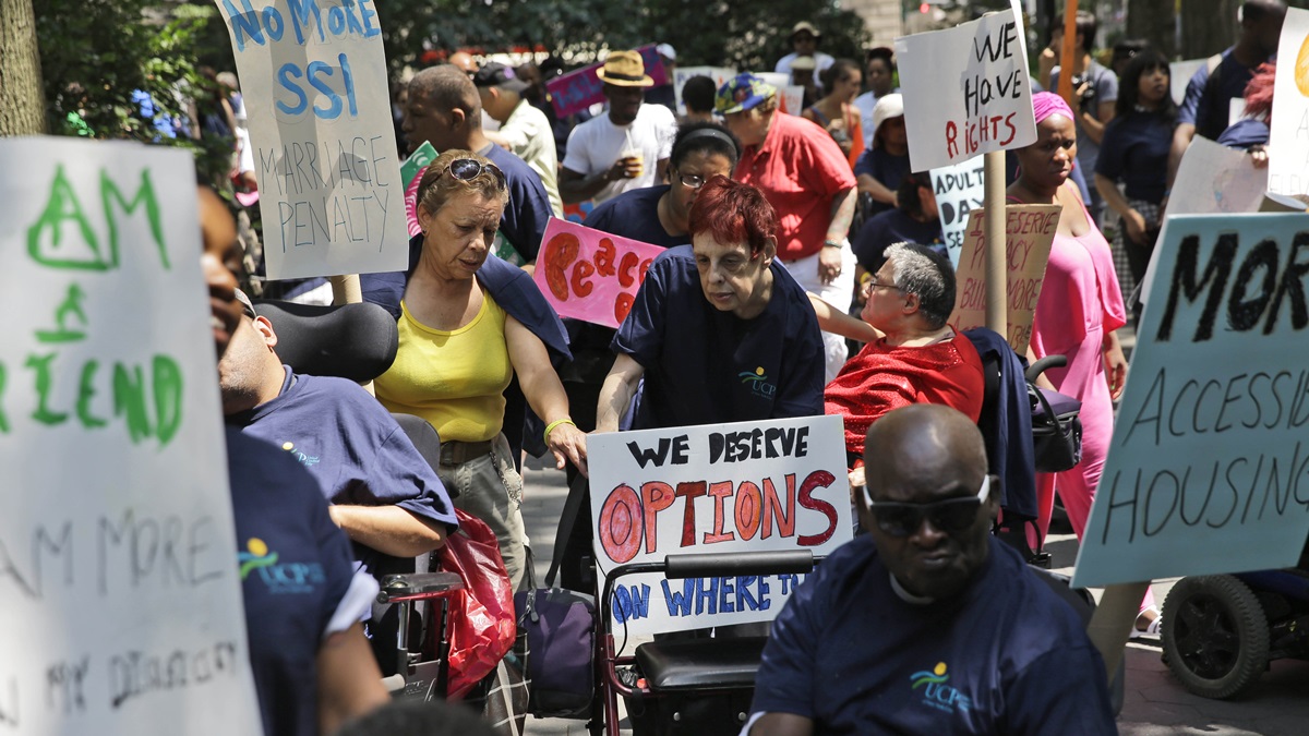  People marching with United Cerebral Palsy prepare to participate in the inaugural Disability Pride Parade in New York, Sunday, July 12, 2015. The parade grand marshal was former U.S. Sen. Tom Harkin, the Iowa Democrat who 25 years ago sponsored the Americans With Disabilities Act. (AP Photo/Seth Wenig) 