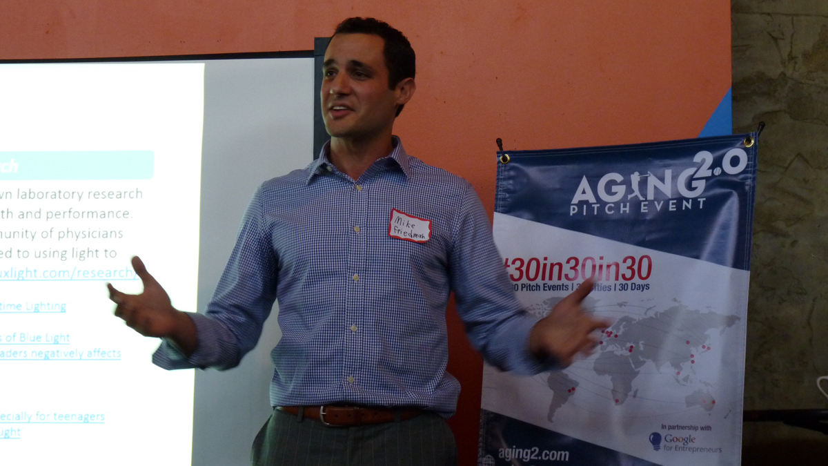  Mark Friedman from the Philadelphia startup dlux makes his pitch during the Aging 2.0 event at North Bowl. (Todd Bookman/WHYY) 