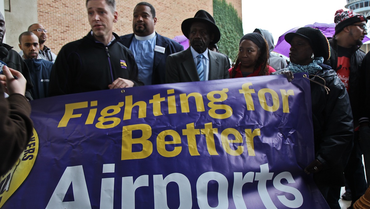  Airport workers, union members and officials protest working conditions at an airport terminal in this NewsWorks file photo (Kimberly Paynter/WHYY) 