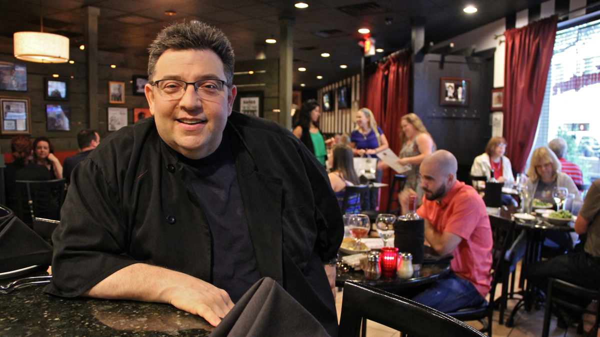 Angelo Lutz presides over Kitchen Consiglieri on Haddon Avenue in Collingswood. (Emma Lee/WHYY)