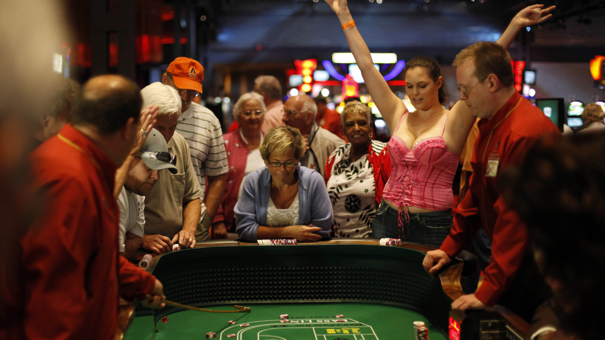  In 2010, people play recently legalized table games on a test day at the Sands Casino Resort Bethlehem in Bethlehem, Pa. Owners of the casino object to proposals to offer online gaming in Pennsylvania. (Matt Rourke/AP Photo) 