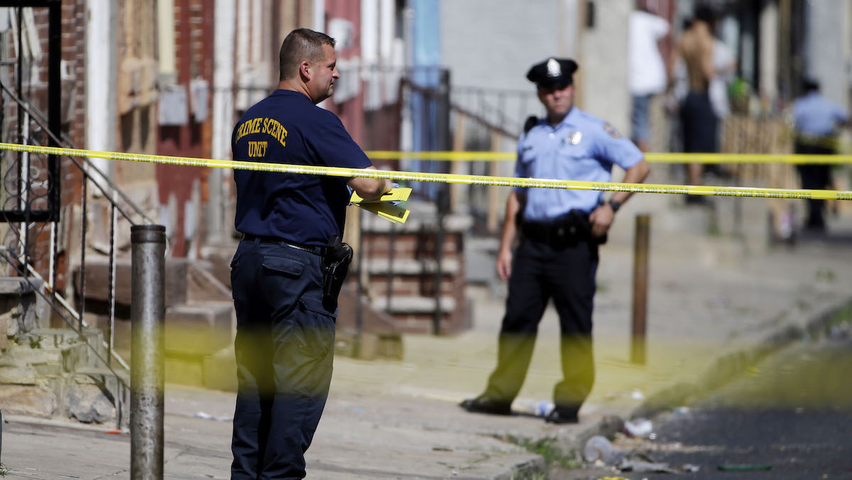  Philadelphia police at a crime scene.  (AP Photo/Matt Rourke) 