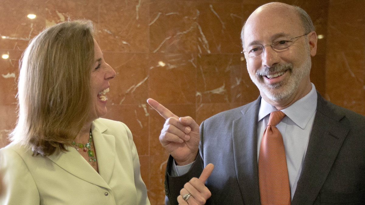  Katie McGinty and Tom Wolf share a laugh on the campaign trail. Gov.-elect Wolf has appointed McGinty his chief of staff. (AP file photo)  