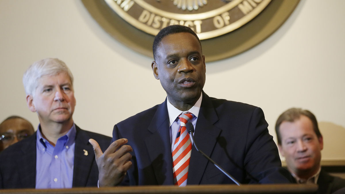  Michigan Gov. Rick Snyder, left, listens as Detroit emergency manager Kevyn Orr discusses his strategy. Meanwhile, New Jersey Gov. Chris Christie is considering appointment of an emergency manager for Atlantic City. (AP Photo/Carlos Osorio) 