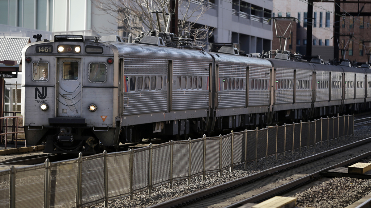 An NJ Transit train approaches the New Brunswick train station. (AP Photo/Mel Evans) 