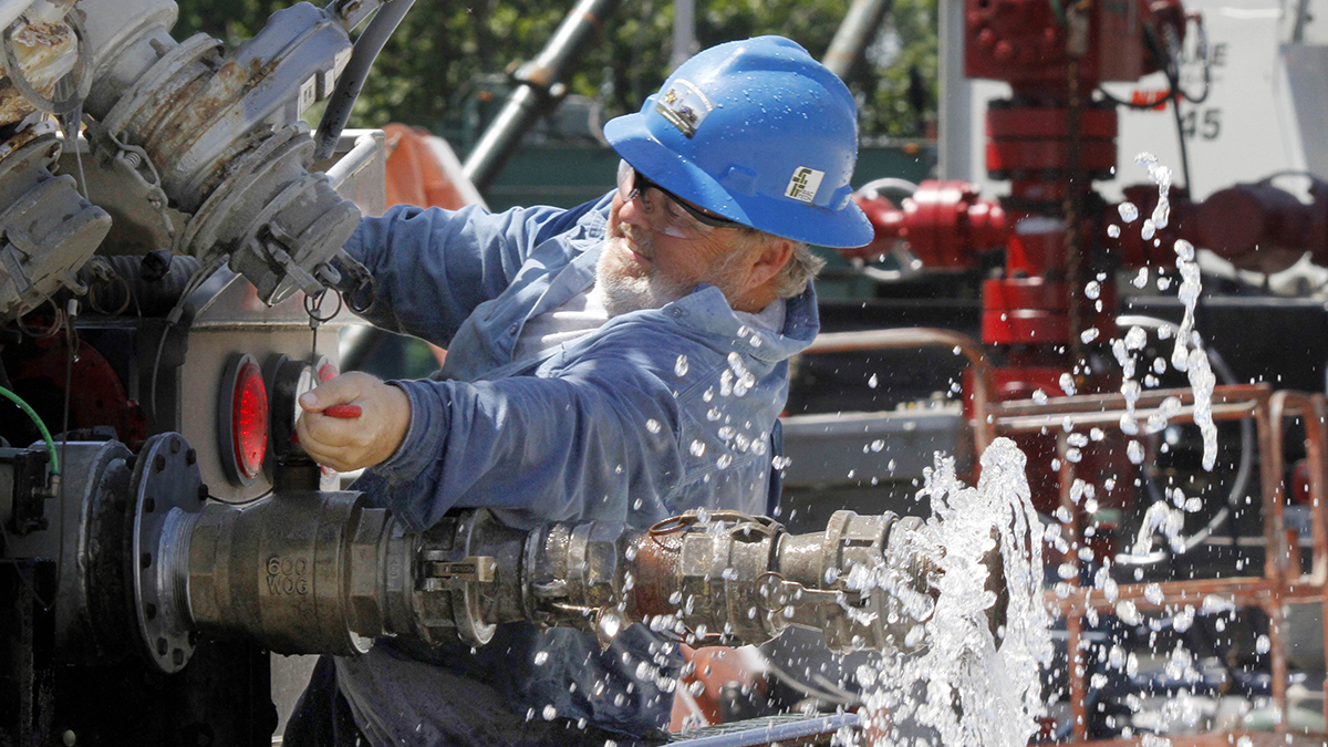 A local contractor closed a valve on his tanker truck outside Range Resources in Claysville