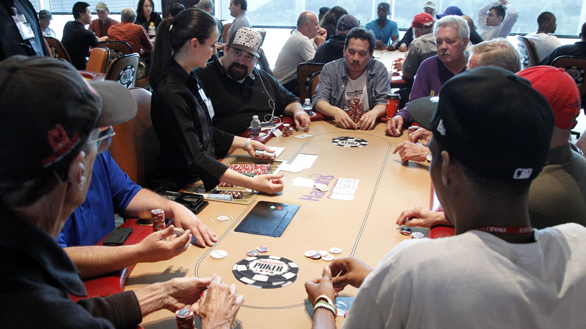 Gamblers play poker at Harrah's in Chester City