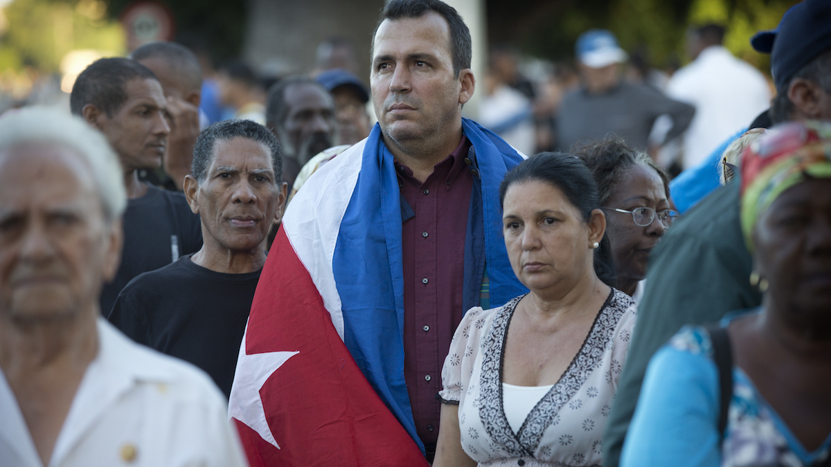 Mourners wait to enter Revolution Square at the start of weeklong services honoring Fidel Castro