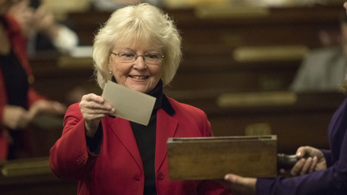 Elector Tina Pickett casts her ballot during Pennsylvania's 58th Electoral College at the state Capitol in Harrisburg Monday. Members of Pennsylvania's 58th Electoral College met at the state Capitol amid demonstrations by hundreds of protesters to cast the state's 20 electoral votes for President-elect Donald Trump. Trump beat Democrat Hillary Clinton in Pennsylvania by fewer than 45