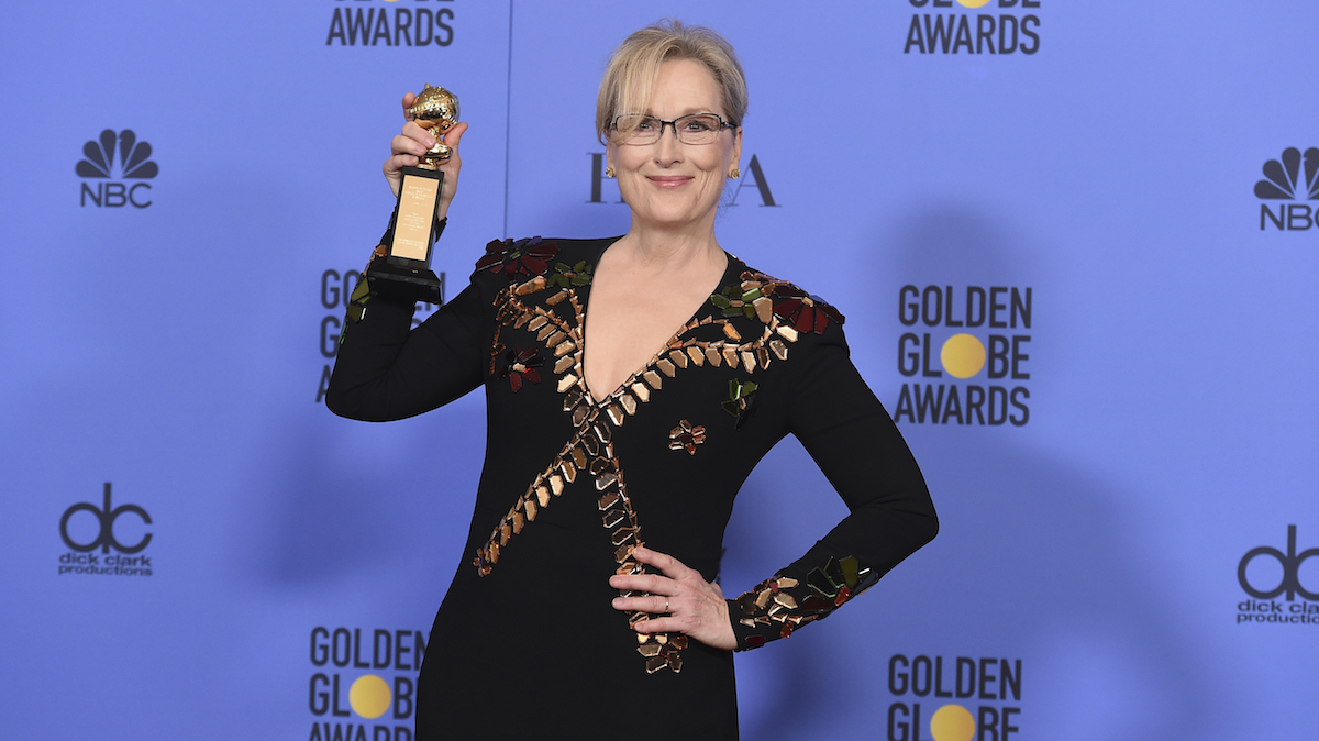 Meryl Streep poses in the press room with the Cecil B. DeMille award at the 74th annual Golden Globe Awards at the Beverly Hilton Hotel on Sunday