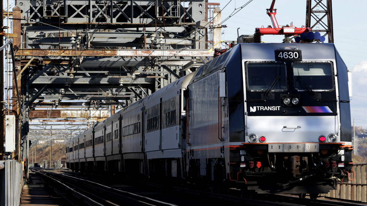 A New Jersey Transit train travels across a portal bridge in Kearny, New Jersey. NJ Transit will nt meet the federal deadline for installation of the new safety measure 
