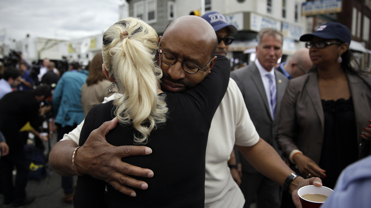 Philadelphia Mayor Michael Nutter hugs Lori Dee Patterson