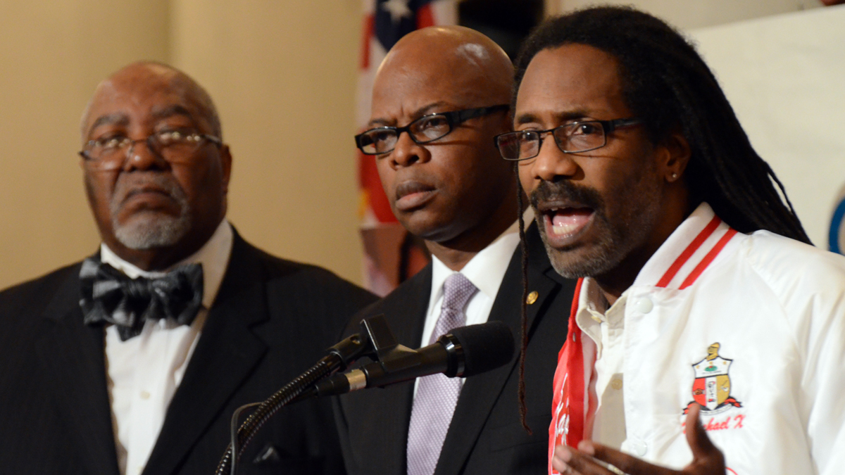  Michael Coard, a Cheyney University graduate and lawyer for a coalition suing Pennsylvania, speaks Tuesday at a rally in the Capitol Rotunda organized in an effort to press the state to help the financially struggling school. Listening are state Reps. Curtis Thomas, left, and Stephen Kinsey. (AP Photo/Marc Levy) 