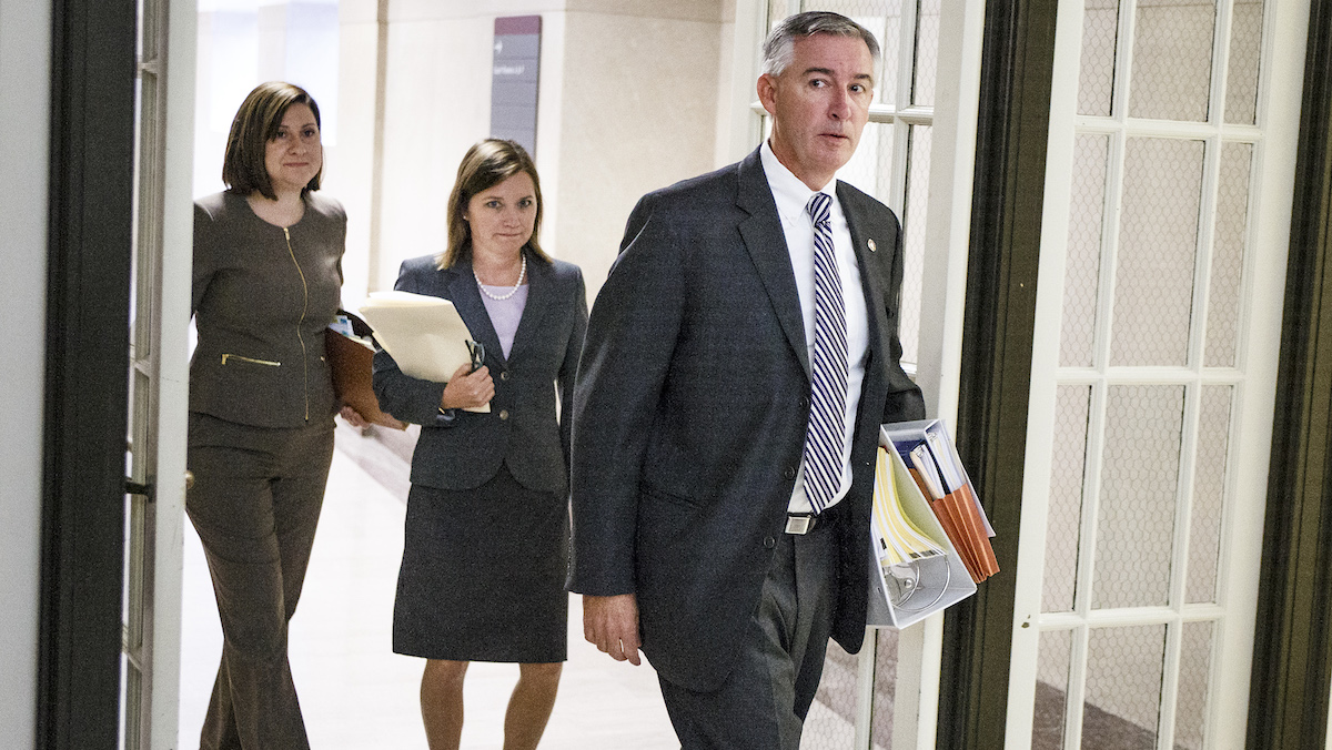 Montgomery County District Attorney Kevin Steele walks into the courtroom on the second day of Pennsylvania Attorney Kathleen Kane's trial at the Montgomery County Courthouse in Norristown