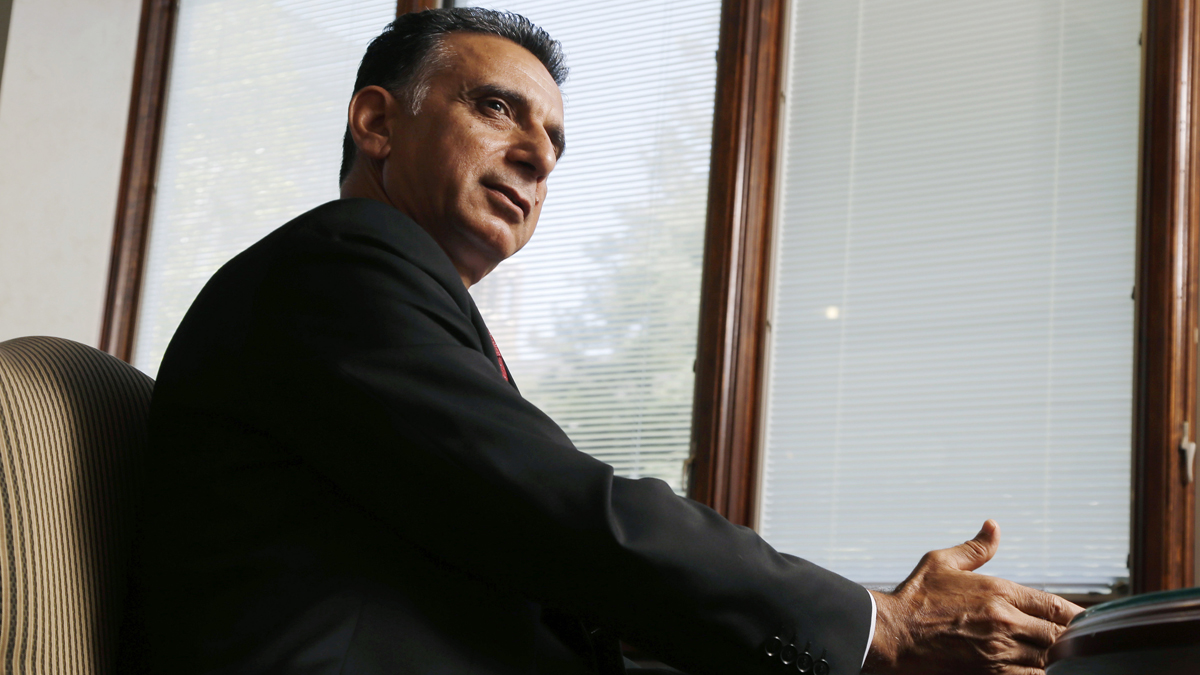  In this Tuesday, June 18, 2013 photograph, Rowan University President Ali Houshmand talks about growth at the school in Glassboro, N.J.  (AP Photo/Mel Evans) 
