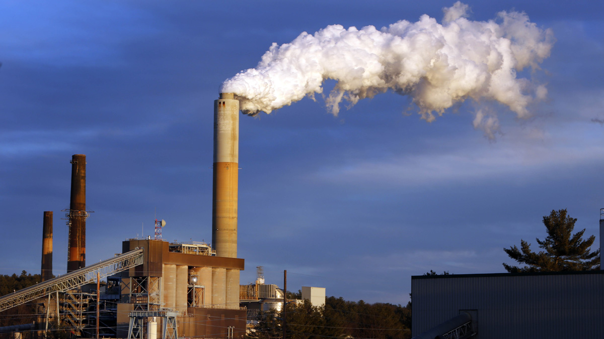 A plume of steam billows from the coal-fired Merrimack Station in Bow, New Hampshire. President Barack Obama Monday unveiled the final version of his unprecedented regulations clamping down on carbon dioxide emissions from existing U.S. power plants. The Obama administration first proposed the rule last year. Opponents plan to sue immediately to stop the rule's implementation. (AP file photo) 