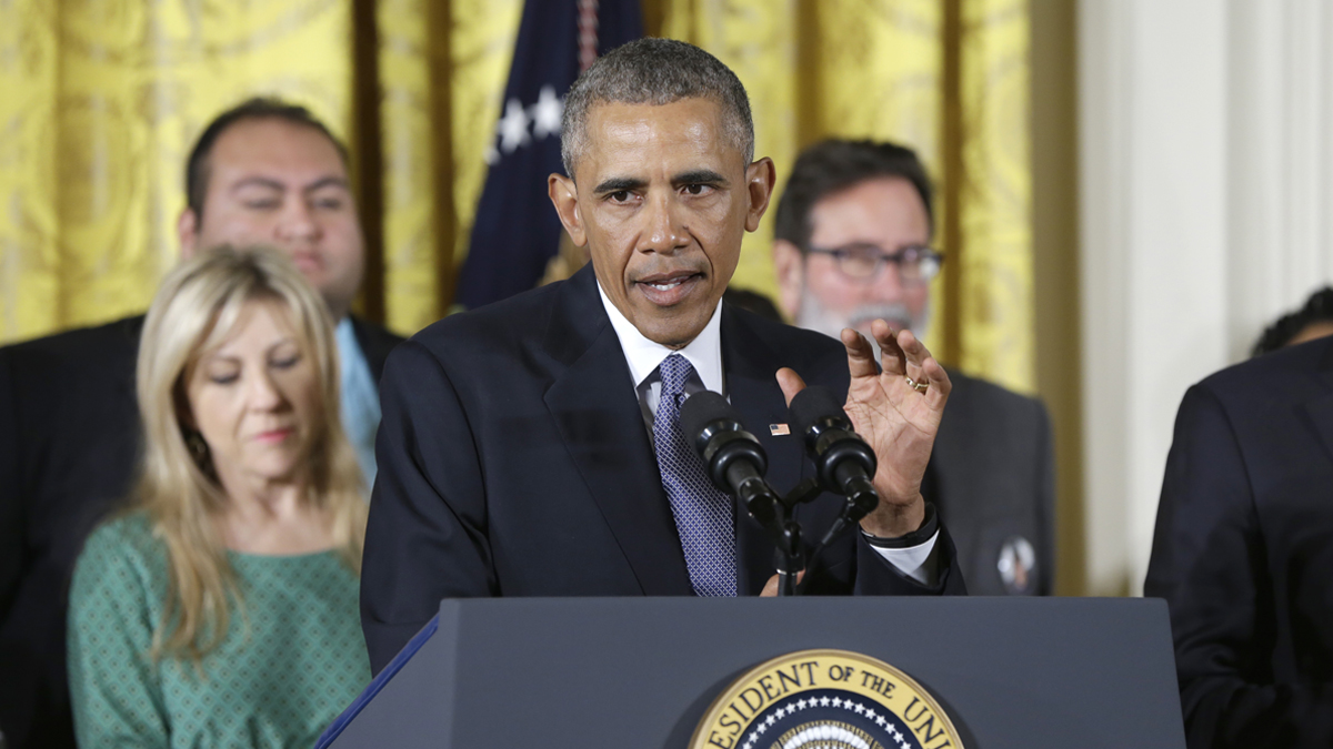  President Barack Obama, joined by gun violence victims, speaks in the East Room of the White House in Washington, Tuesday, Jan. 5, 2016, about steps his administration is taking to reduce gun violence. Also on stage are stakeholders, and individuals whose lives have been impacted by the gun violence. (Carolyn Kaster/AP Photo) 