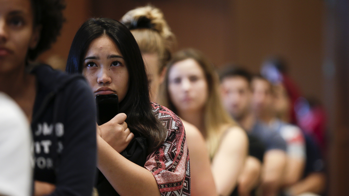 New students at San Diego State University watch a video on sexual consent during an August orientation meeting in San Diego. Defining consensual sex is a growing trend by universities under pressure to do more to protect victims.  (Gregory Bull/AP Photo)
