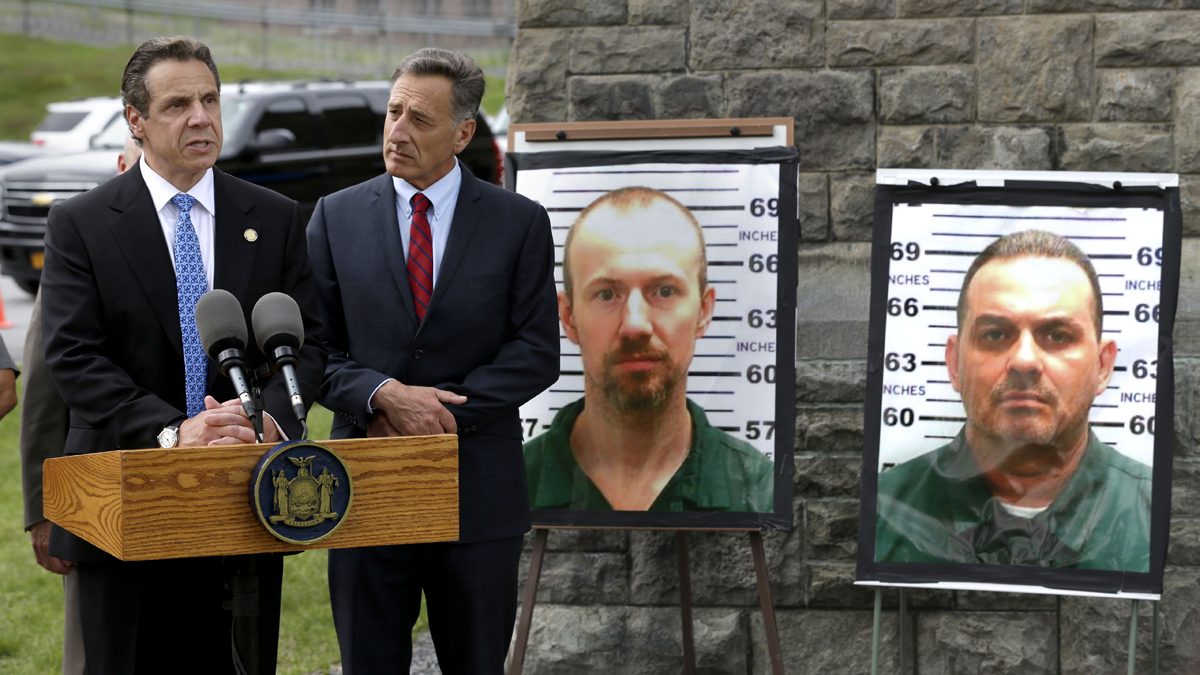  New York Governor Andrew Cuomo, (left), speaks while Vermont Governor Peter Shumlin listens during a news conference in front of the Clinton Correctional Facility in Dannemora, N.Y., Wednesday, June 10, 2015.  Police were resuming house-to-house searches near the maximum-security prison in northern New York where David Sweat and Richard Matt, two killers escaped using power tools, authorities said Wednesday as they renewed their plea for help from the public. (Seth Wenig/AP Photo) 