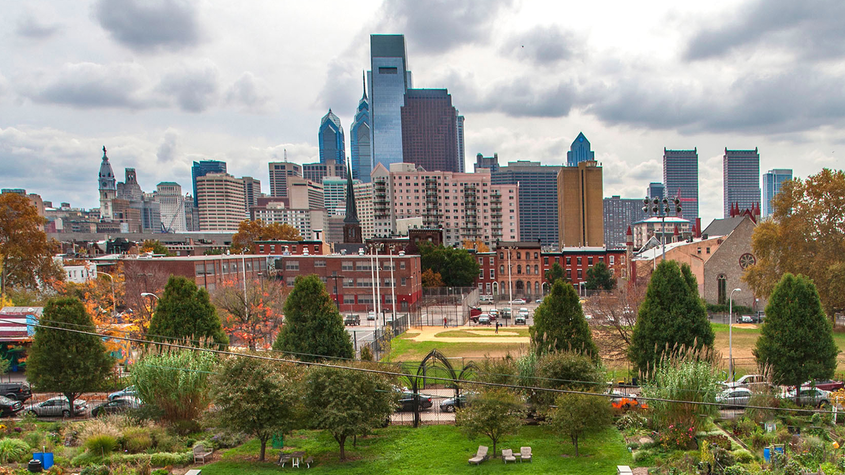  The Philadelphia skyline can be seen past a community garden located in the Spring Garden neighborhood. (PRNewsFoto/Greater Philadelphia Tourism Marketing Corporation/R. Kennedy for GPTMC) 