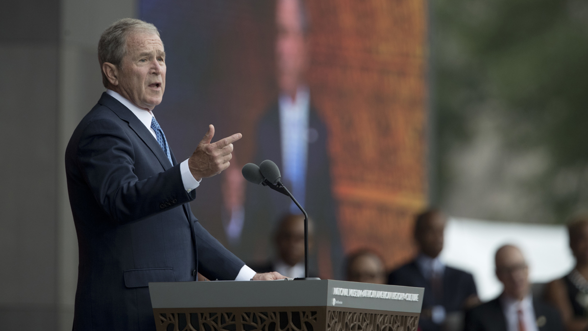 Former President George W. Bush speaks during the opening ceremony of the Smithsonian National Museum of African American History and Culture on the National Mall in Washington