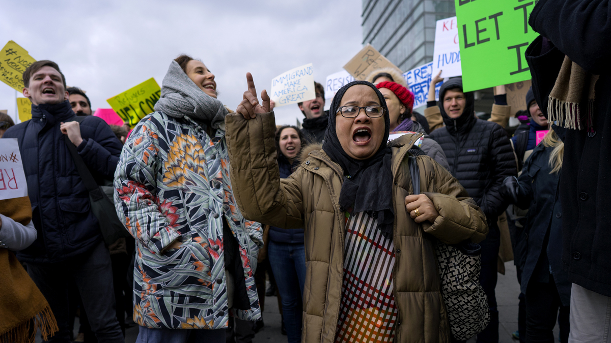 Protesters assemble at John F. Kennedy International Airport in New York, Saturday, Jan. 28, 2017 after two Iraqi refugees were detained while trying to enter the country. On Friday, Jan. 27, President Donald Trump signed an executive order suspending all immigration from countries with terrorism concerns for 90 days. Countries included in the ban are Iraq, Syria, Iran, Sudan, Libya, Somalia and Yemen, which are all Muslim-majority nations. (AP Photo/Craig Ruttle)