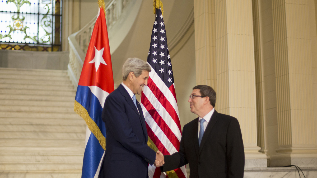  Secretary of State John Kerry shakes hands with Cuban Foreign Minister Bruno Rodriguez prior to their meeting at the Foreign Ministry in Havana, Cuba, Friday, Aug. 14, 2015. Kerry traveled to the Cuban capital to raise the U.S. flag and formally reopen the long-closed U.S. Embassy. Cuba and U.S. officially restored diplomatic relations July 20, as part of efforts to normalize ties between the former Cold War foes. (Pablo Martinez Monsivais/AP Photo, Pool) 