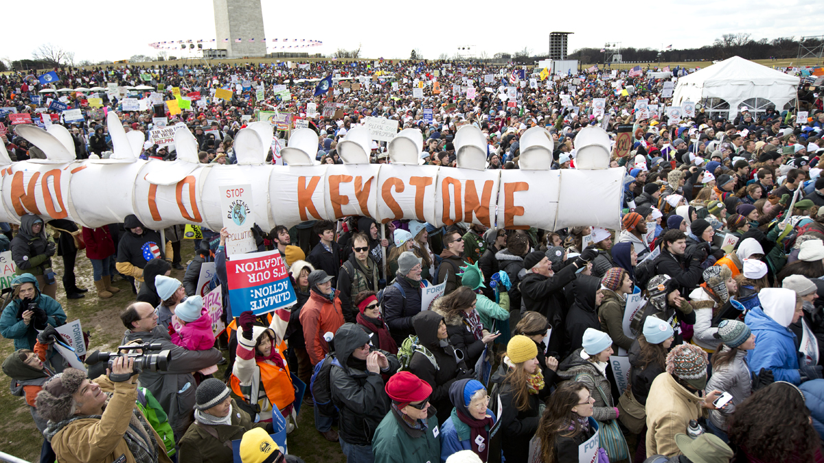  Protestors gather at the National Mall in Washington calling on President Barack Obama to reject the Keystone XL oil pipeline from Canada, as well as act to limit carbon pollution from power plants and 'move beyond' coal and natural gas, Sunday, Feb. 17, 2013. (Manuel Balce Ceneta/AP Photo) 