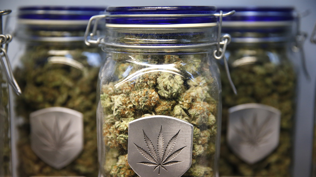  Different strains of pot are displayed for sale at Medicine Man marijuana dispensary in Denver, Friday Dec. 27, 2013.  (Brennan Linsley/AP Photo) 