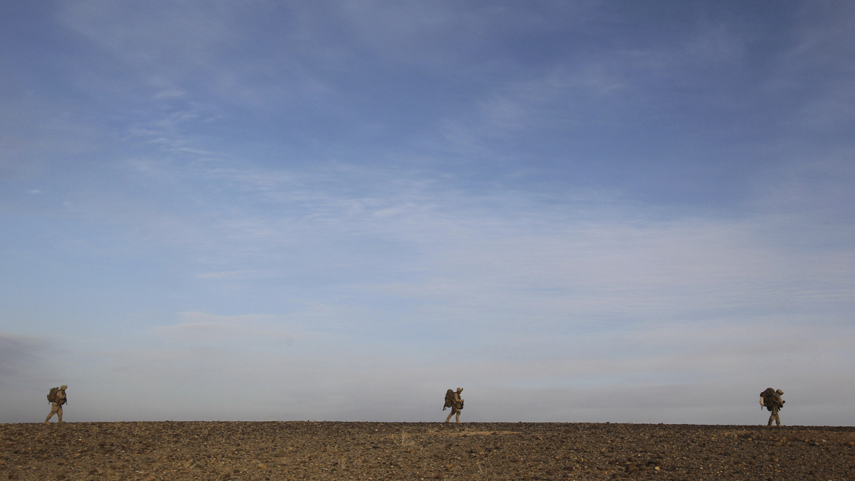 U.S. Marines patrol outside Marjah in Afghanistan's Helmand province. (David Guttenfelder/AP Photo