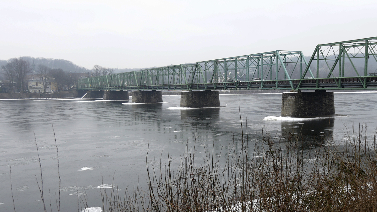Traffic crosses the bridge into Lambertville