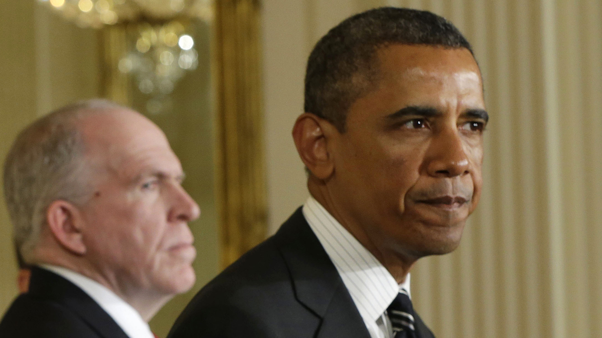  President Barack Obama and CIA Director John Brennan (left) in the East Room of the White House (Pablo Martinez Monsivais/AP Photo) 