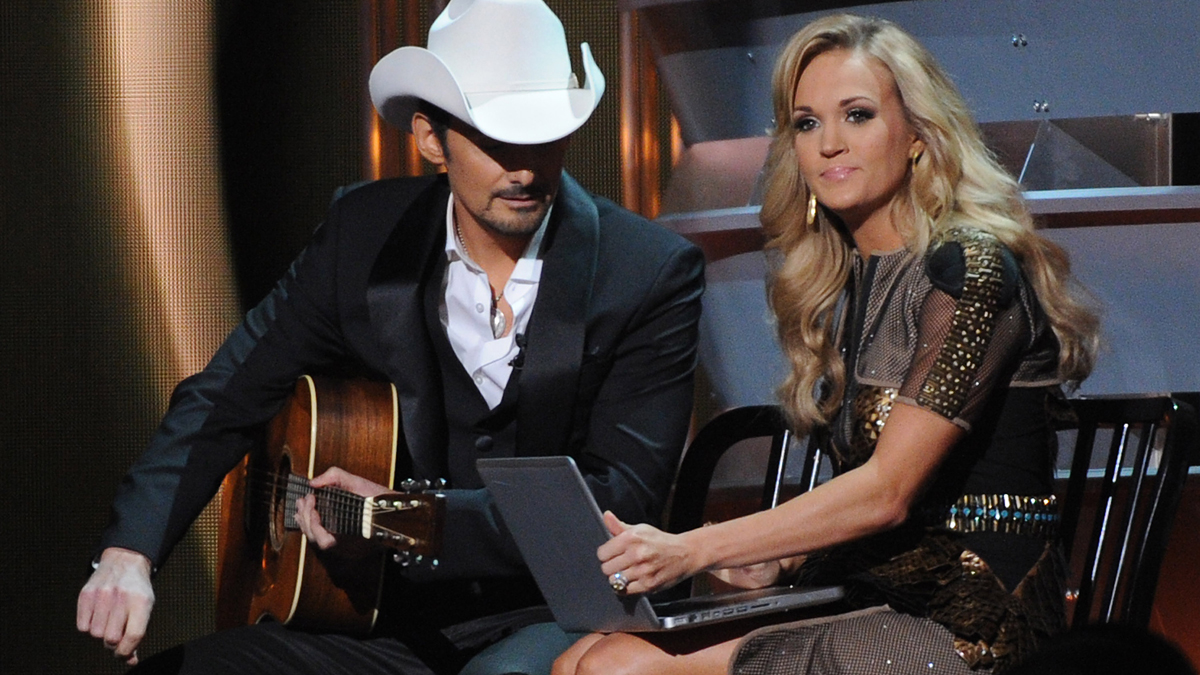  Hosts Carrie Underwood and Brad Paisley onstage 