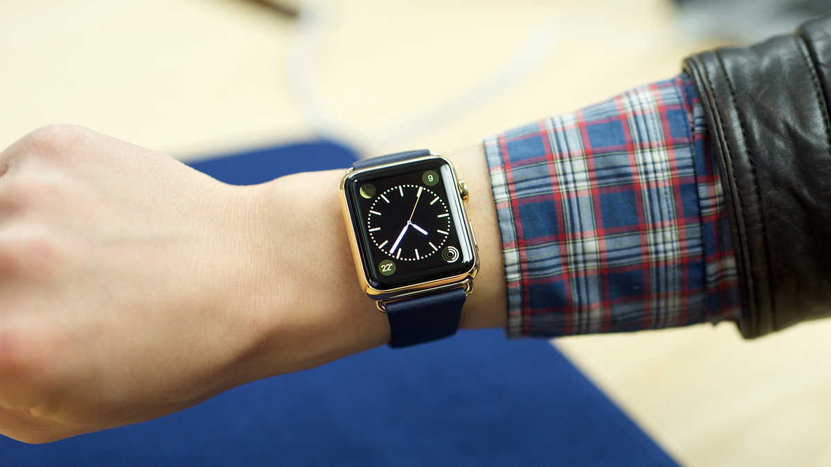  A customer tries on an Apple Watch at the Eaton Centre Apple Store on Friday, April 10, 2015, in Toronto. (Photo by Ryan Emberley/Invision for Apple/AP Images) 