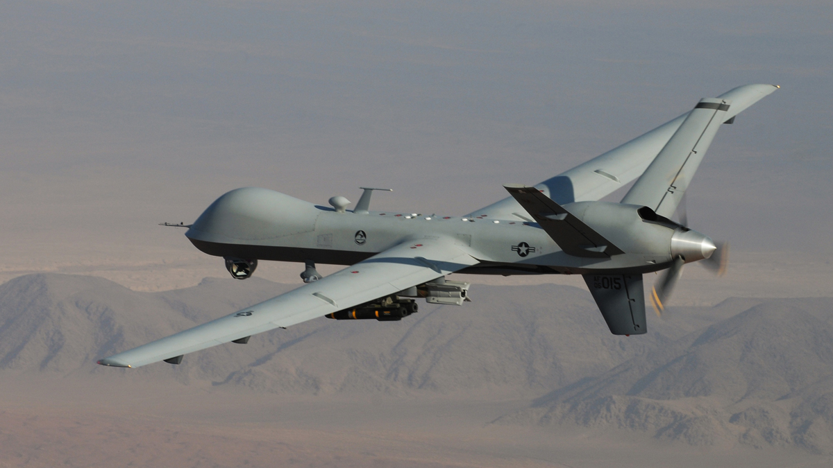  This undated handout photo provided by the U.S. Air Force shows a MQ-9 Reaper, armed with GBU-12 Paveway II laser guided munitions and AGM-114 Hellfire missiles, piloted by Col. Lex Turner during a combat mission over southern Afghanistan. (AP Photo/Lt. Col. Leslie Pratt, US Air Force) 