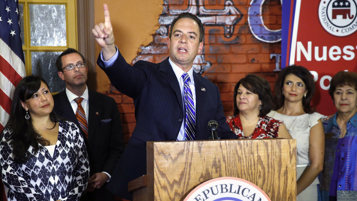 Republican National Committee Chairman Reince Priebus gestures as he speaks during a news conference and meeting with state Republican Hispanics