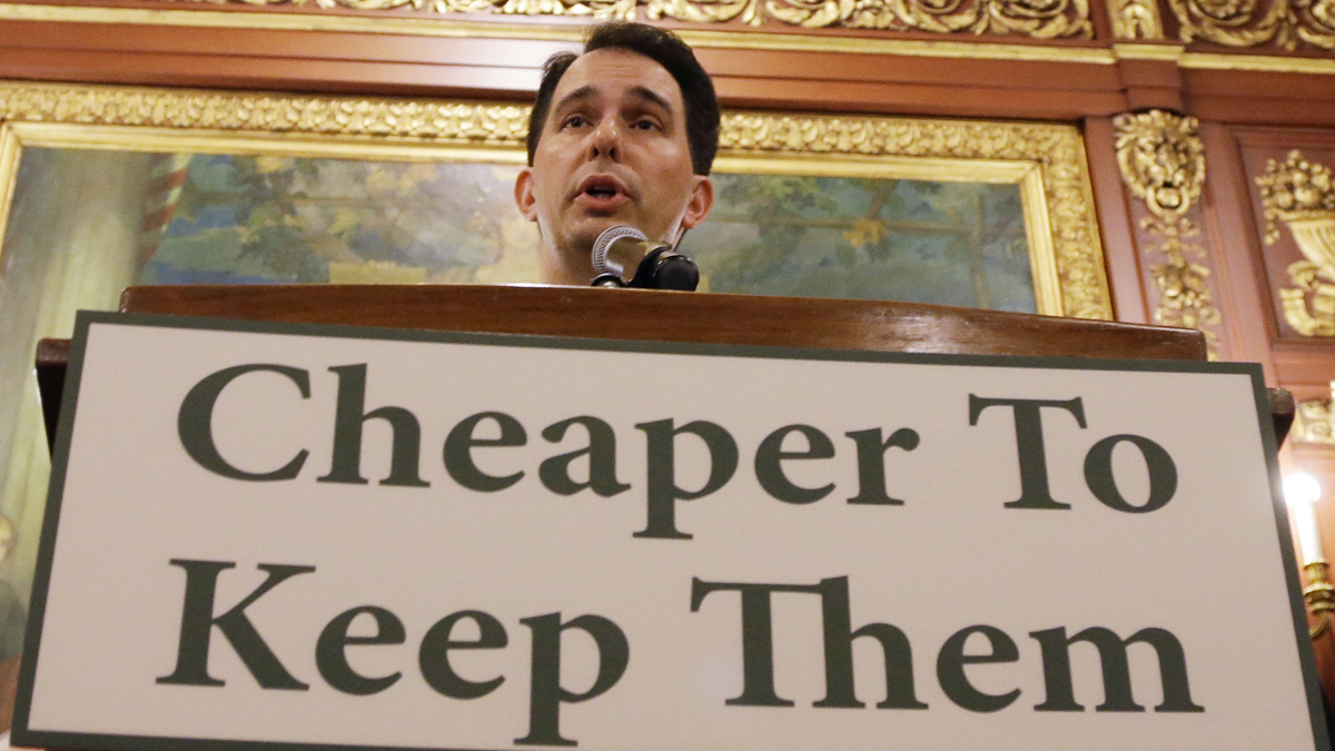  Wisconsin Gov. Scott Walker talks about a deal to pay for a new arena for the Milwaukee Bucks at a news conference Thursday, June 4, 2015, in Madison, Wis. Taxpayers would pick up half the cost of a new $500 million arena for the NBA basketball team under a financial deal that would rely on current and former team owners for the rest, Walker said Thursday. (Morry Gash/AP Photo) 