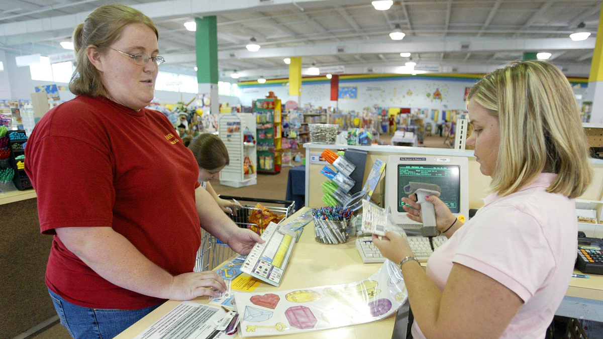 A sales associate rings up school supplies that a teacher is buying in this file photo (Wade Payne/AP Photo)