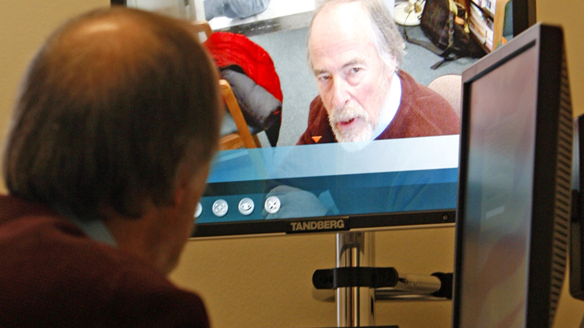  A psychiatrist counsels patients via Web cams, reaching people who sometimes went without such services. (Toby Talbot/AP Photo) 