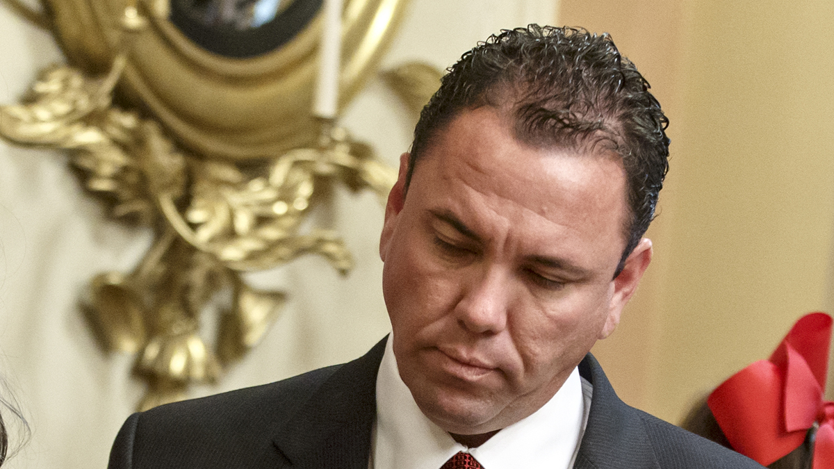  In a photo taken Thursday, Nov. 21, 2013, newly-elected Rep. Vance McAllister, a Republican of Louisiana, waits to be sworn in at the Capitol in Washington. McAllister says he's asking his family and constituents for forgiveness after a West Monroe newspaper published a video that it says shows the congressman kissing a female staffer in his congressional office in Monroe, La. McAllister, only in office a little over four months, attracted national attention because of his endorsement from the bearded men of the 'Duck Dynasty' reality TV show. (J. Scott Applewhite/AP Photo, file) 
