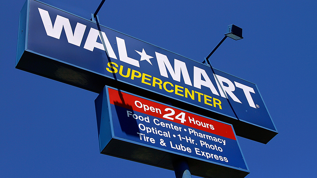  Persons walk in and out of a Walmart store, Friday, Aug. 26, 2016, in Dallas. (Tony Gutierrez/AP Photo) 