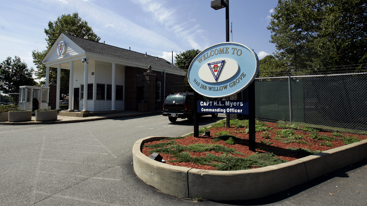 A vehicle enters the front gate to the Willow Grove Naval Air Station in Horsham