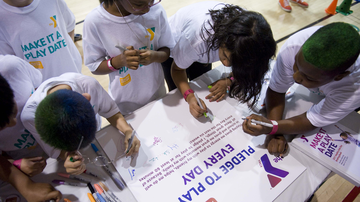 Kids pledge to exercise everyday at the Washington Y on Wednesday