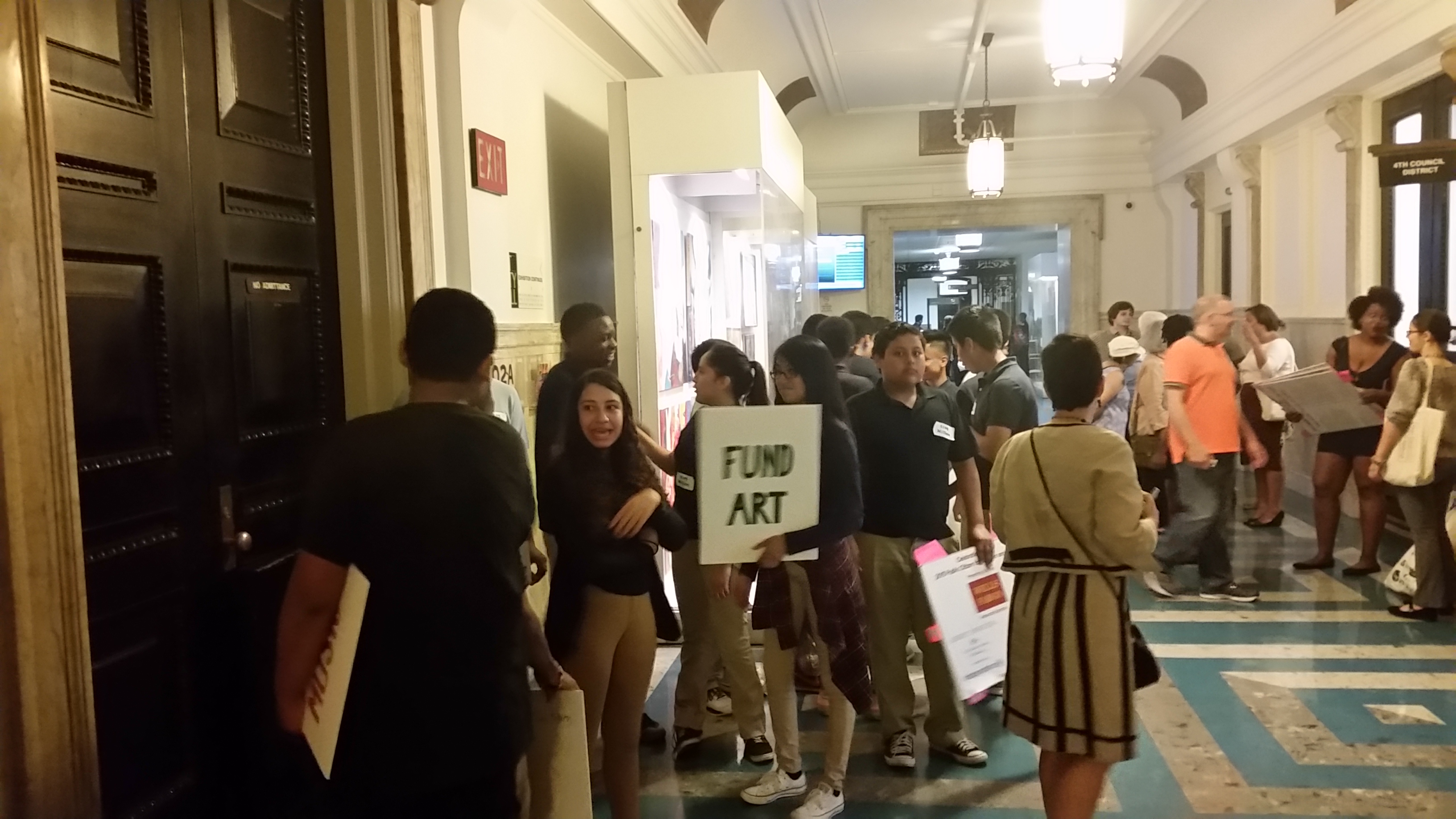  Students gather outside City Council chambers before the Wednesday meeting. (Tom MacDonald/WHYY) 