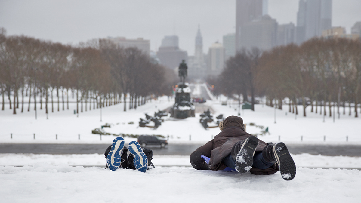  Alyssa Milletti (left) and Dan McCormick prepare for a ride down the famous 'Rocky' steps in front of the Philadelphia Museum of Art on Thursday.  (Lindsay Lazarski/WHYY) 