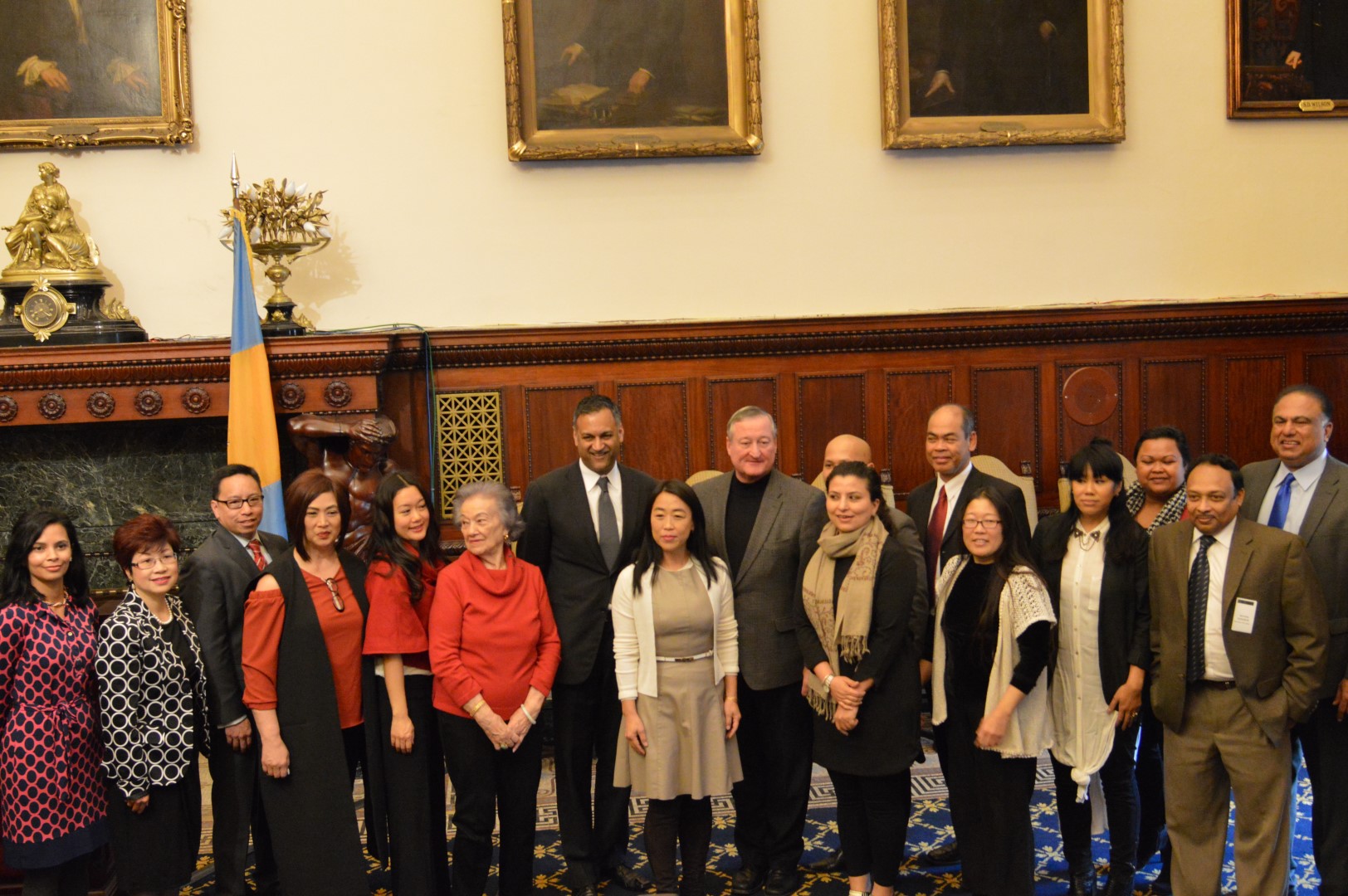 Mayor Jim Kenney (center) stands with members of the Philadelphia Commission on Asian-American Affairs at City Hall Thursday. (Tom MacDonald/ WHYY)