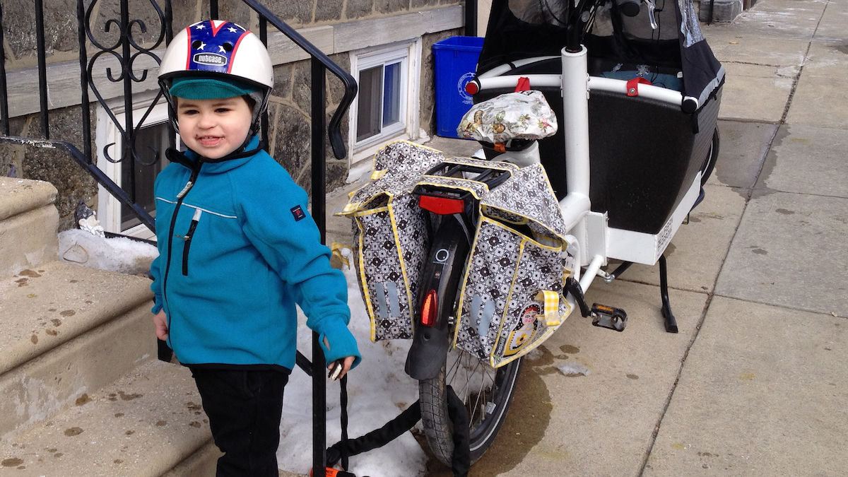  Layering is among the ways you can help keep children warm while bicycling during the cold winter months. (Dena Driscoll/for NewsWorks) 